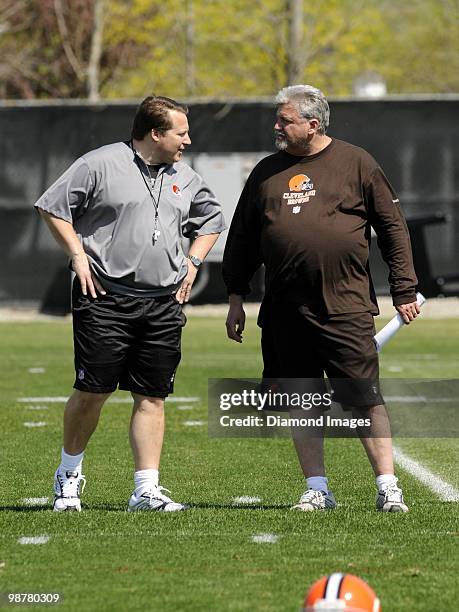 Head coach Eric Mangini of the Cleveland Browns talks with assistant coach Rob Ryan during the team's rookie and free agent mini camp on April 30,...