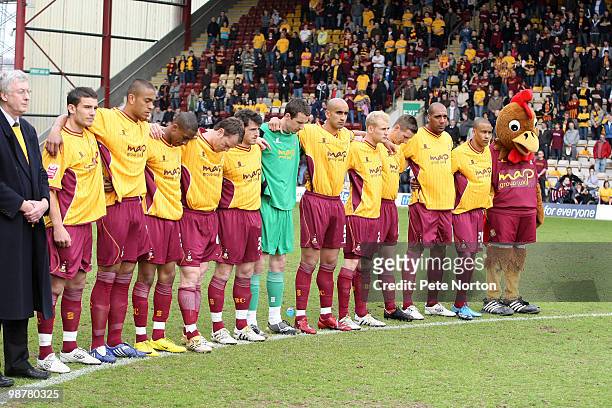 Bradford City players line up to observe a minutes silence for the 25th anniversary of the 1985 Bradford stadium fire prior to the Coca Cola League...