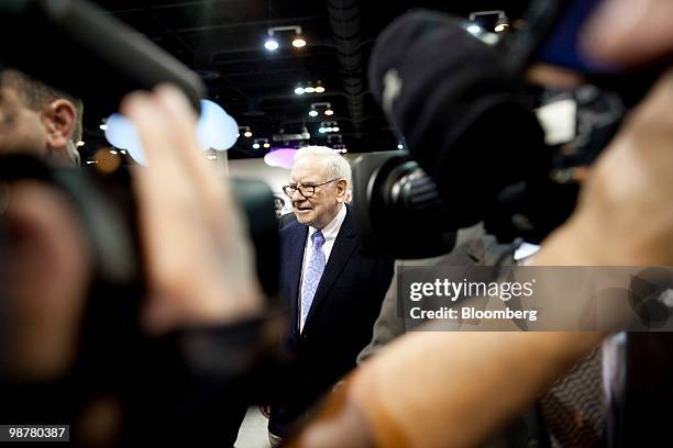 Warren Buffett, chief executive officer of Berkshire Hathaway, tours the exhibition floor prior to the Berkshire Hathaway annual meeting in Omaha,...