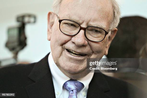 Warren Buffett, chief executive officer of Berkshire Hathaway, tours the exhibition floor prior to the Berkshire Hathaway annual meeting in Omaha,...