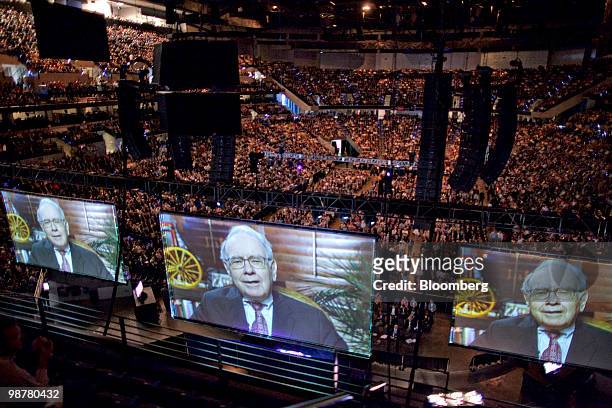Warren Buffett, chief executive officer of Berkshire Hathaway, appears in a taped video message to shareholders prior to the start of the Berkshire...