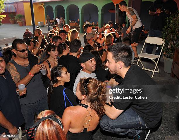 Musician Mike Shinoda of Linkin Park backstage with fans at KROQ's Epicenter '09: Presented By Rogue at the Fairplex on August 22, 2009 in Pomona,...