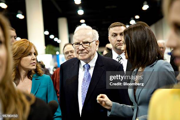 Warren Buffett, chief executive officer of Berkshire Hathaway, tours the exhibition floor prior to the Berkshire Hathaway annual meeting in Omaha,...