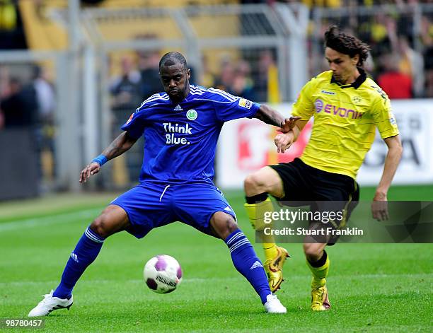 Neven Subotic of Dortmund challenges Grafite of Wolfsburg during the Bundesliga match between Borussia Dortmund and VfL Wolfsburg at Signal Iduna...