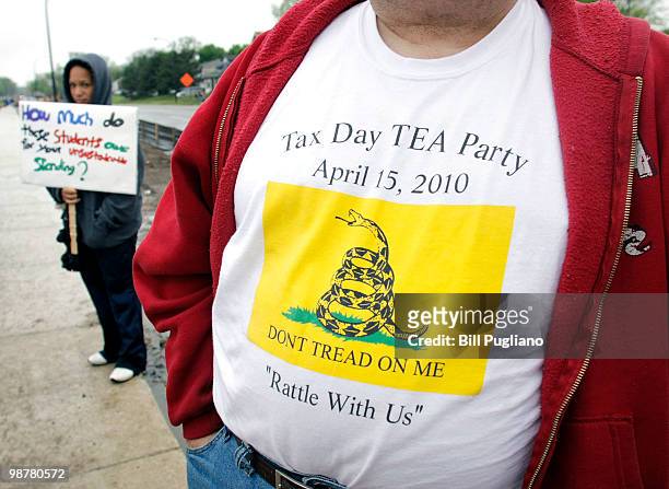 Protestors demonstrate outside the University of Michigan Stadium May 1, 2010 in Ann Arbor, Michigan. U.S. President Barack Obama was at the...