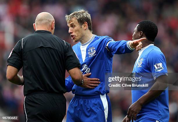 Phil Neville of Everton appeals to referee Howard Webb after his teams goal is dissalowed for off side during the Barclays Premier League match...