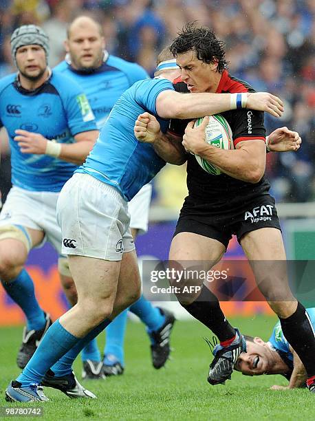 Toulouse's center Yannick Jausion vies with Leinster's captain Leo Cullen during their European cup rugby union semi-final match Toulouse vs...