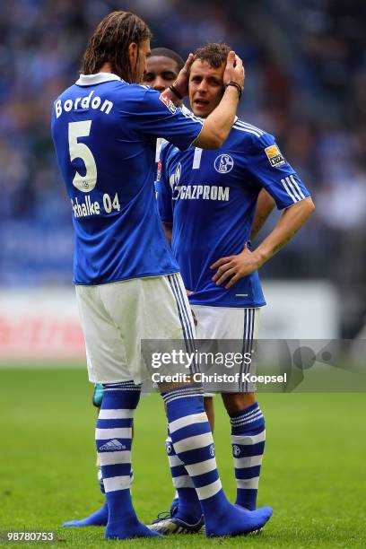 Marcelo Bordon, Jefferson Farfan and Rafinha of Schalke look dejected after losing 0-2 the Bundesliga match between FC Schalke 04 and SV Werder...