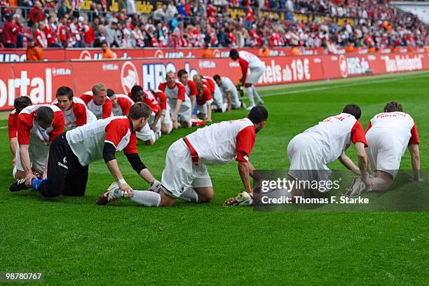 Players of Freiburg celebrate after the Bundesliga match between 1. FC Koeln and SC Freiburg at RheinEnergieStadion on May 1 in Cologne, Germany.