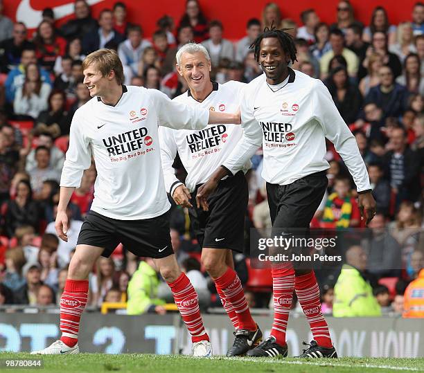 Ugo Ehiogu of The Rivals celebrates scoring their second goal during the United Relief charity match in aid of Sport Relief and the Manchester United...