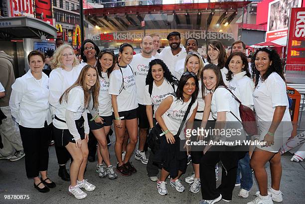 Jesse Martin with United Heathcare Volunteers attend the 13th Annual Entertainment Industry Foundation Revlon Run/Walk For Women at Times Square on...