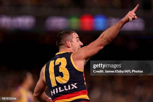 Taylor Walker of the Crows celebrates a goal during the 2018 AFL round15 match between the Adelaide Crows and the West Coast Eagles at the Adelaide...