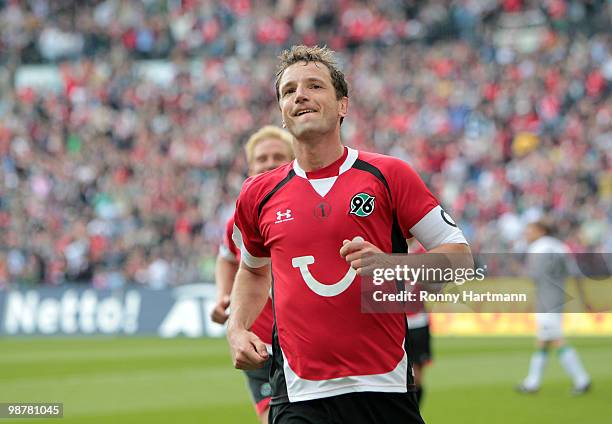 Jan Bruggink of Hannover celebrates his teams sixth goal during the Bundesliga match between Hannover 96 and Borussia Moenchengladbach at AWD Arena...