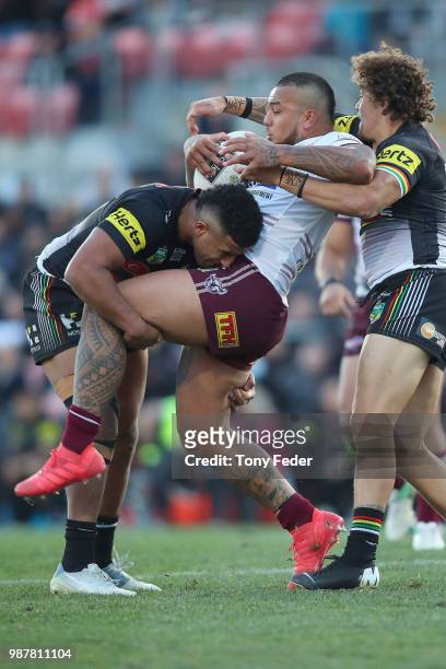 Addin Fonua-Blake of the Sea Eagles is tackled during the round 16 NRL match between the Penrith Panthers and the Manly Sea Eagles at Panthers...