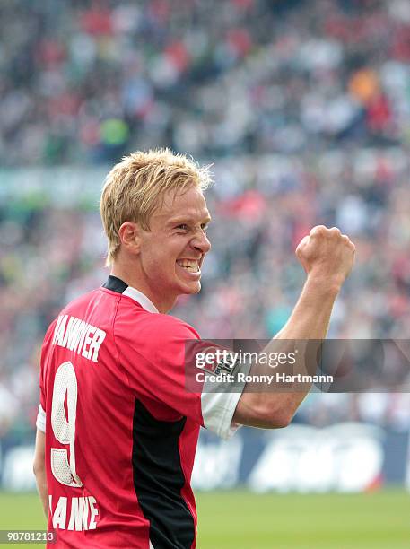 Mike Hanke of Hannover celebrates during the Bundesliga match between Hannover 96 and Borussia Moenchengladbach at AWD Arena on May 1, 2010 in...