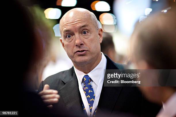 David Sokol, chairman of Berkshire Hathaway's MidAmerican Energy Holdings Co., speaks to shareholders on the exhibition floor prior to the Berkshire...