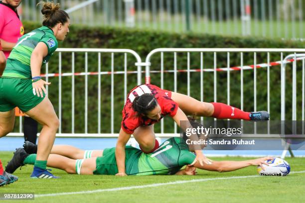 Louise Galvin of Ireland scores a try during the Grand Prix Series - Rugby Seven match between Ireland and Wales on June 29, 2018 in Marcoussis,...