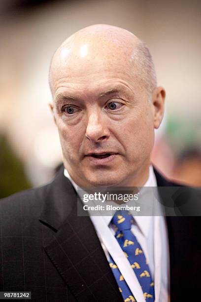 David Sokol, chairman of Berkshire Hathaway's MidAmerican Energy Holdings Co., speaks to shareholders on the exhibition floor prior to the Berkshire...