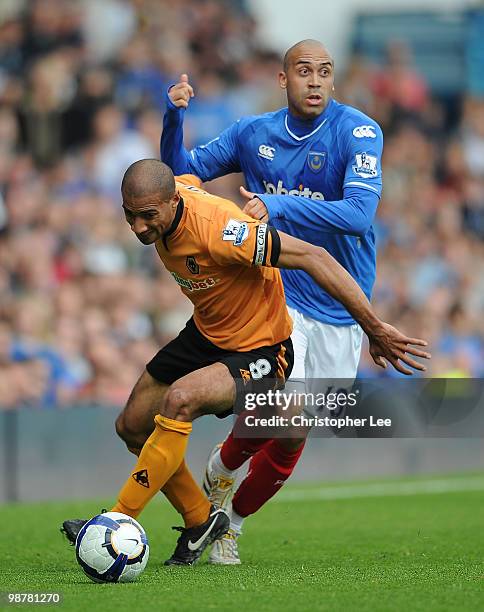 Anthony Vanden Borre of Portsmouth flicks the ball past Karl Henry of Wolves during the Barclays Premier League match between Portsmouth and...