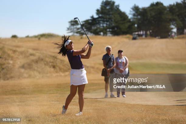 Stephanie Lau of The USA plays a shot during a semi final on day five of The Ladies' British Open Amateur Championship at Hillside Golf Club on June...
