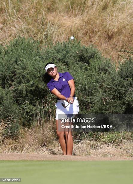 Stephanie Lau of The USA plays a shot during a semi final on day five of The Ladies' British Open Amateur Championship at Hillside Golf Club on June...