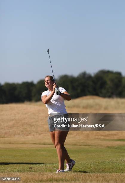 Leonie Harm of Germany plays a shot during a semi final on day five of The Ladies' British Open Amateur Championship at Hillside Golf Club on June...