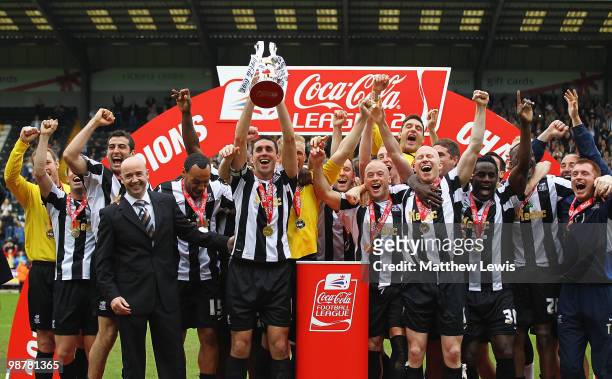 Notts County celebrate winning the Coca-Cola League Two Championship after the Coca-Cola League Two match between Notts County and Cheltenham Town at...