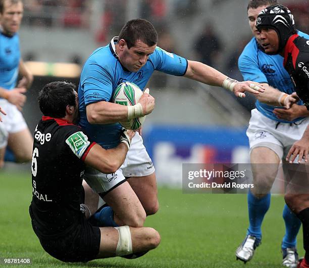 Shane Jennings of Leinster is tackled by Jean Bouilhou during the Heineken Cup semi final match between Toulouse and Leinster at Stade Municipal on...