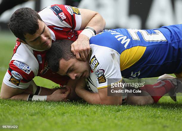 Rhys Williams of Warrington Wolves scores a try during the Engage Rugby Super League Magic Weekend match between Salford City Reds and Warrington...
