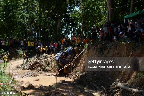 Malaysia's team race during the Kelantan to Yala 4x4 off road car rally in Yala, southern Thailand, on June 30, 2018.