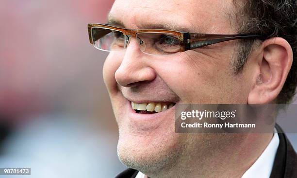 Manager Joerg Schmadtke of Hannover smiles prior to the Bundesliga match between Hannover 96 and Borussia Moenchengladbach at AWD Arena on May 1,...