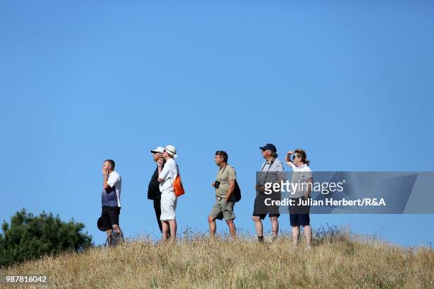 Spectators watch a semi final on day five of The Ladies' British Open Amateur Championship at Hillside Golf Club on June 30, 2018 in Southport,...