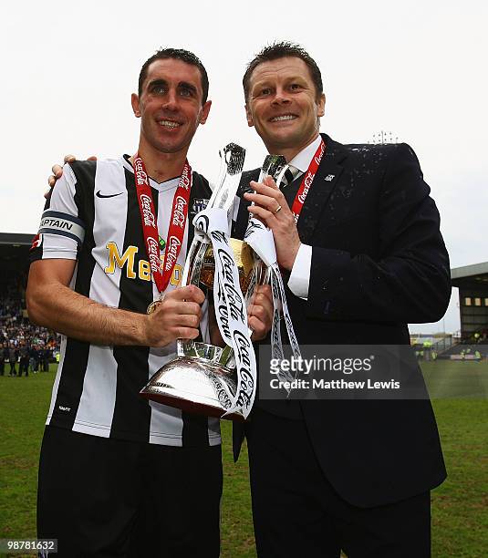 John Thompson, Captain and Steve Cotterill, manager of Notts County celebrate winning the Coca-Cola League Two Championship after the Coca-Cola...