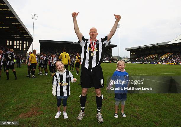 Lee Hughes of Notts County celebrates winning the Coca-Cola League Two Championship after the Coca-Cola League Two match between Notts County and...