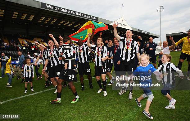 Notts County celebrate winning the Coca-Cola League Two Championship after the Coca-Cola League Two match between Notts County and Cheltenham Town at...