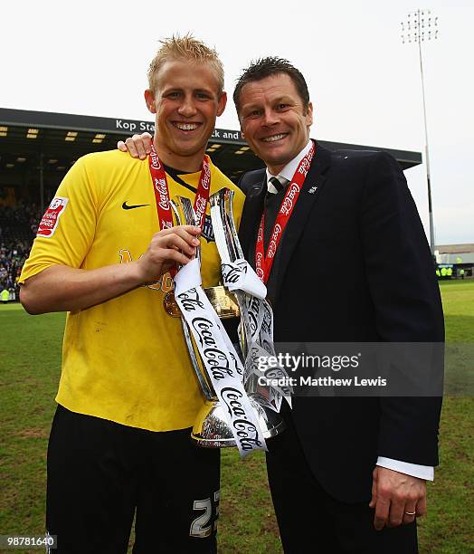 Kasper Schmeichel and Steve Cotterill, manager of Notts County celebrate winning the Coca-Cola League Two Championship after the Coca-Cola League Two...