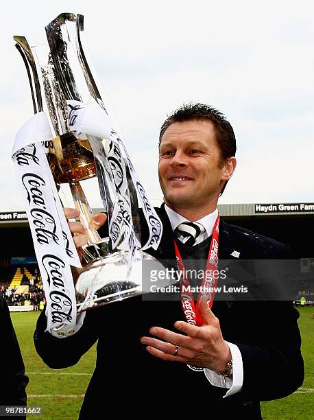 Steve Cotterill, manager of Notts County celebrates winning the Coca-Cola League Two Championship after the Coca-Cola League Two match between Notts...