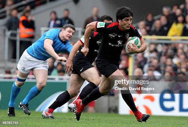David Skrela of Toulouse breaks clear to score the second try during the Heineken Cup semi final match between Toulouse and Leinster at Stade...