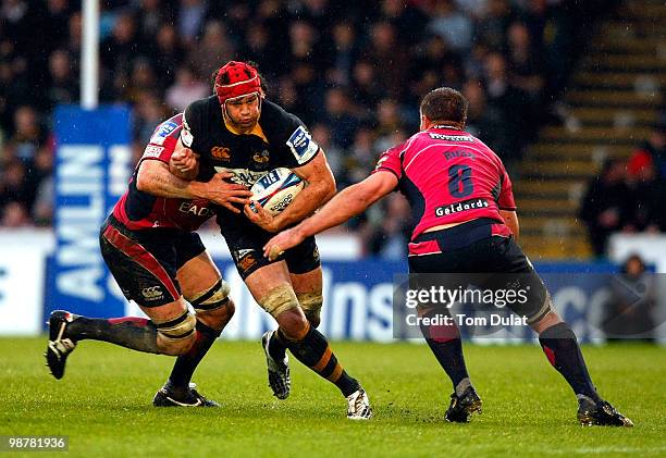 Dan Ward-Smith of London Wasps is challenged during the Amlin Challenge Cup Semi Final match between London Wasps and Cardiff Blues at Adams Park on...