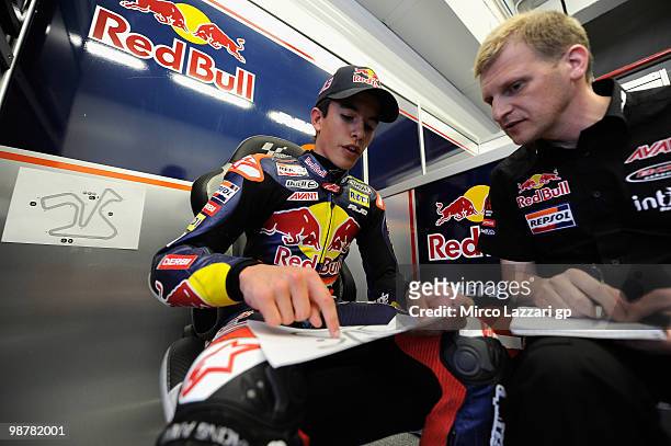 Marc Marquez of Spain and Red Bull AJo Motorsport speaks with his staff in box at Circuito de Jerez on May 1, 2010 in Jerez de la Frontera, Spain.