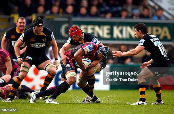 Ma'ama Molitika of Cardiff Blues is challenged by Dan Ward-Smith of London Wasps during the Amlin Challenge Cup Semi Final match between London Wasps...