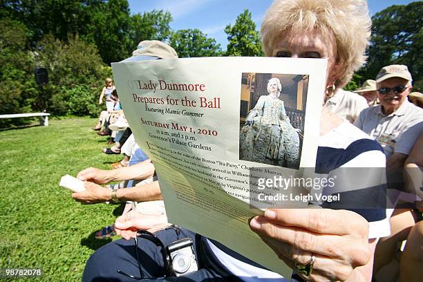 Guest reads the performance guide during the launch of the Colonial Williamsburg Artist Program at Colonial Williamsburg on May 1, 2010 in...