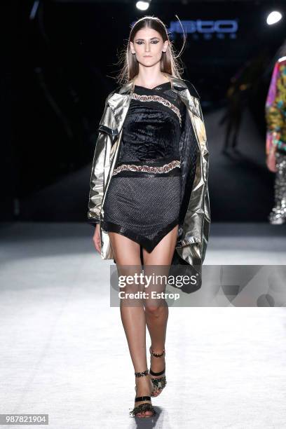 Daiane Conterato walks the runway at the Custo Barcelona show during the Barcelona 080 Fashion Week on June 28, 2018 in Barcelona, Spain.