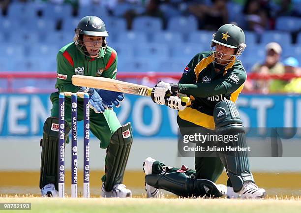 Mushfiqur Rahim watches as Salman Butt of Pakistan scores runs during The ICC World Twenty20 Group A match between Pakistan and Bangladesh played at...