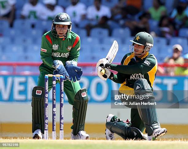 Mushfiqur Rahim watches as Salman Butt of Pakistan scores runs during The ICC World Twenty20 Group A match between Pakistan and Bangladesh played at...