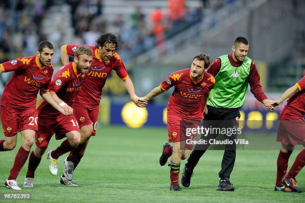 Celebrates of Francesco Totti, Luca Toni and Daniele De Rossi of AS Roma during the Serie A match between Parma FC and AS Roma at Stadio Ennio...