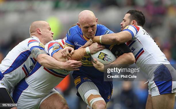 Keith Senior of Leeds Rhinos is tackled by Damien Blanch and Ben Jeffries of Wakefield Trinity during the Engage Rugby Super League Magic Weekend...