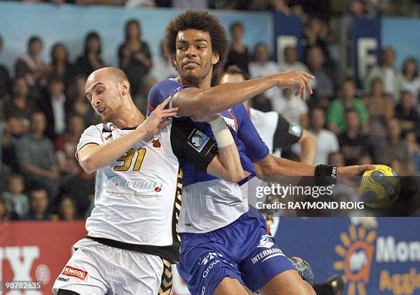 Montpellier's Adrien Dipanda vies with Tchekhov's Timur Dibirov during the Champions League quart final match, on May 1, 2010 at the Rene-Bougnol...