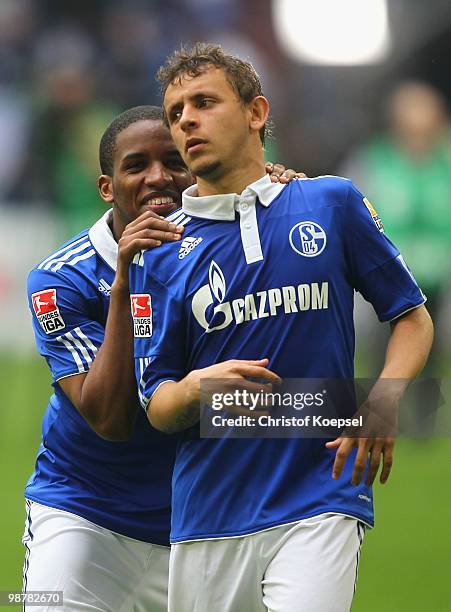 Jefferson Farfan and Rafinha of Schalke are seen after the Bundesliga match between FC Schalke 04 and SV Werder Bremen at Veltins Arena on May 1,...