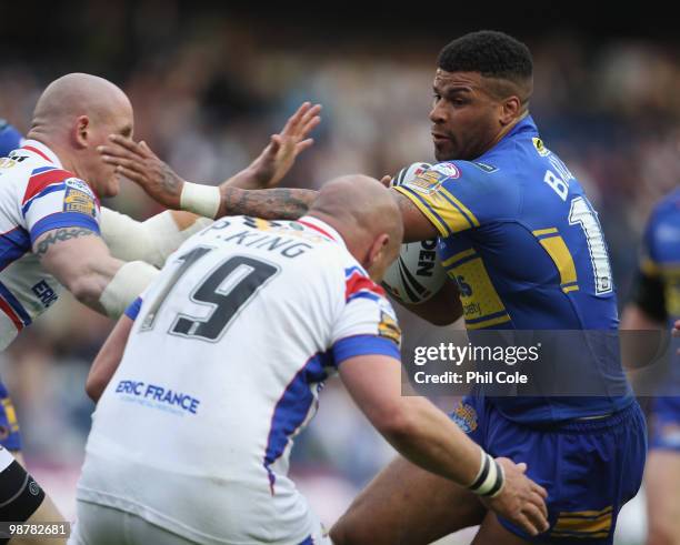 Ryan Bailey of Leeds Rhinos is tackled by Paul King and Paul Johnson of Wakefield Trinity during the Engage Rugby Super League Magic Weekend match...